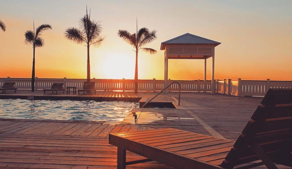 sunset-by-the-pool-remaxvipbelize-1740x960-c-center