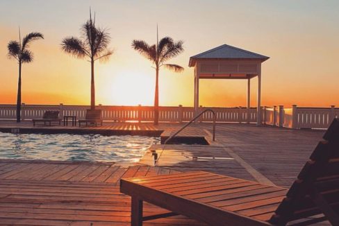 sunset-by-the-pool-remaxvipbelize-1740x960-c-center