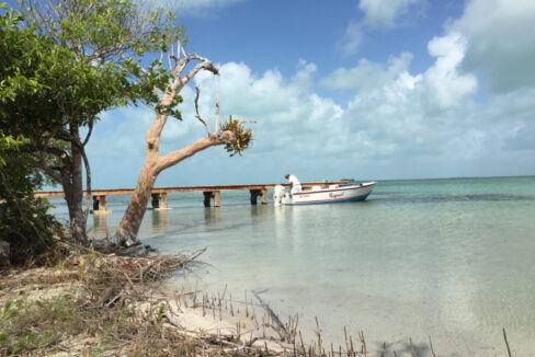 Bracilette-Caye-25-acre-with-pier-and-boat-and-small-beach-area--scaled