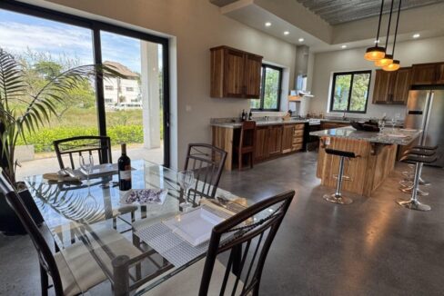 Dining-area-and-kitchen-scaled-1170x600-c-center