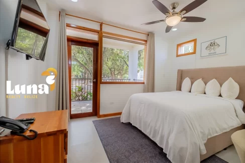 1.-F103-bedroom-looking-to-veranda
