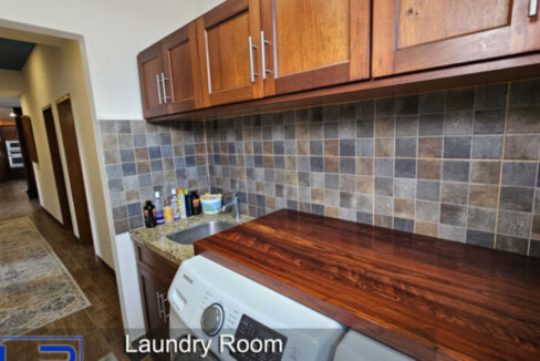 Laundry-Room-storage-and-sink-copy-835x467