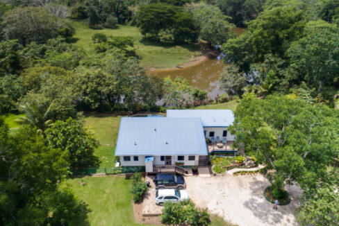aerial-of-house-and-river-from-front (1)