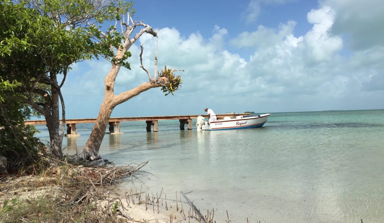 Bracilette-Caye-25-acre-with-pier-and-boat-and-small-beach-area--scaled