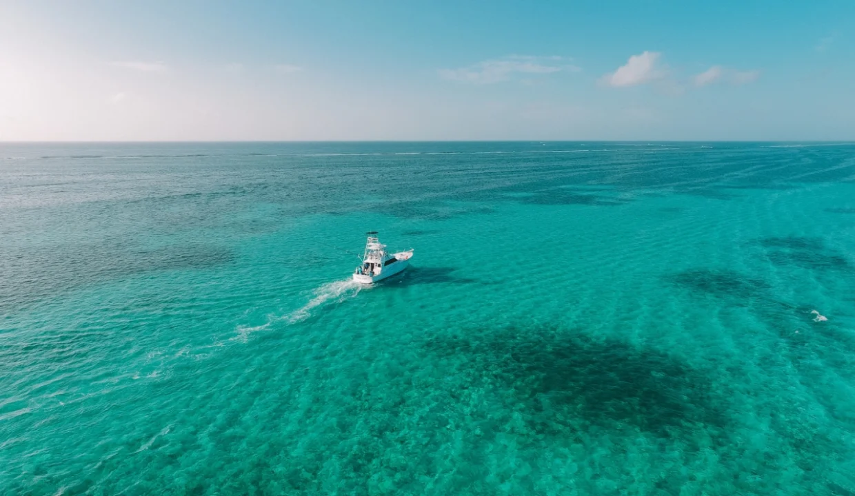 BoatOnOceanReefAmbergrisCaye-JV_20210716_070338_DJI0019-1280x960