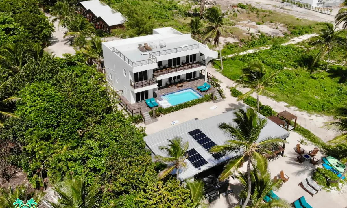 Mangata Villas – A Luxurious Adults-Only Beachfront Retreat with Moon Bar and Main House on Ambergris Caye, Belize