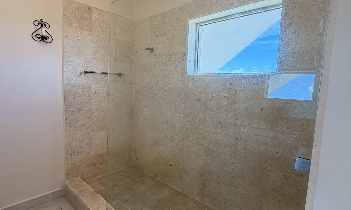 ambergris-caye-canal-front-home-bathroom-skylight-shower
