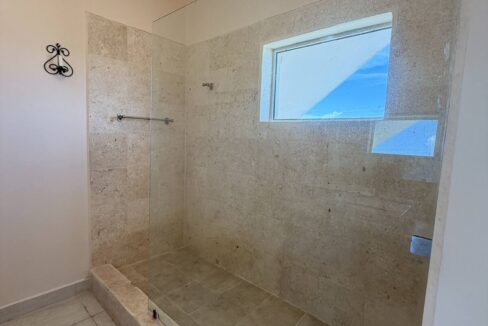 ambergris-caye-canal-front-home-bathroom-skylight-shower