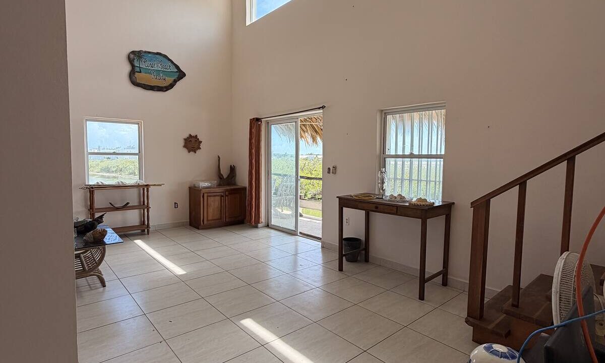 ambergris-caye-canal-front-home-living-room-skylights