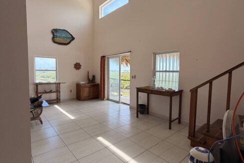 ambergris-caye-canal-front-home-living-room-skylights