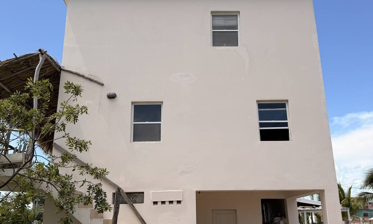 ambergris-caye-canal-front-home-side-exterior