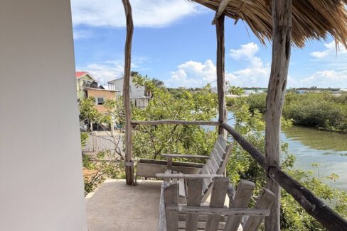 ambergris-caye-canal-front-home-side-yard-palapa
