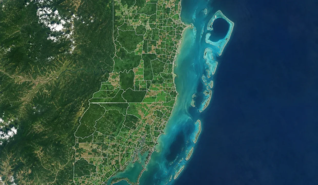 Aerial view of Belize showing land parcels and districts from coast to inland regions