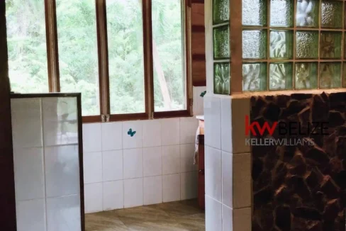kellerwilliamsbelize-mth012406pg-13